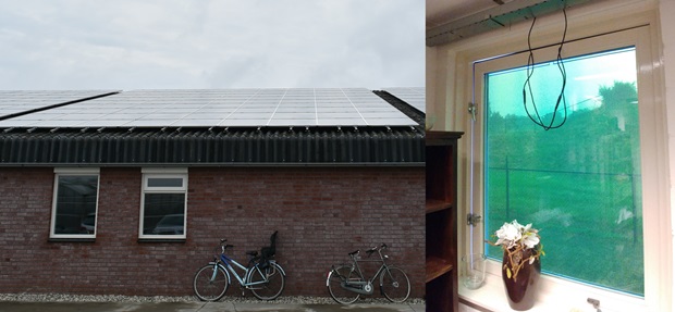 농장지붕의 태양광패널과 창문에 설치된 태양전지판.